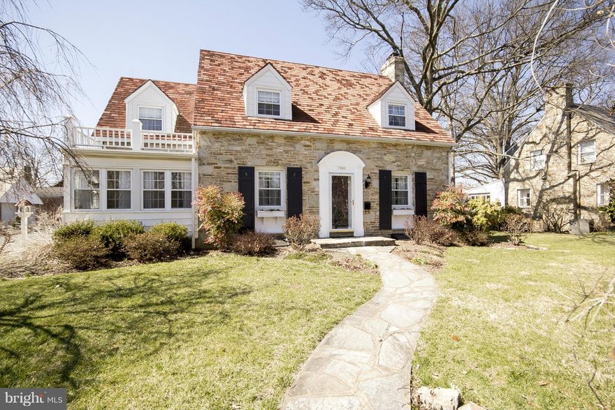 This well cared for home defines CHARM! From the exterior stone facade, terra cotta tile roof, fieldstone sidewalks, interior stone  walls & enclosed porches you won't be disappointed! The well utilized interior space offers an updated kitch, LR, DR, fam rm, main level laundry,4 BR's (1 is a pass thru), 2 FB's, 2 HB's & Finished LL.The generous sized lot is beautifully landscaped. 1 Car Garage