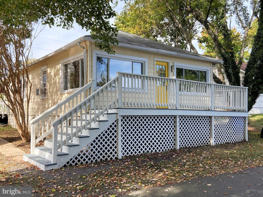 This adorable beach cottage is now available for rent and features newer carpet and laminate flooring, fresh paint, a spacious family room, a front porch, a huge shed for storage and a deck overlooking the large, level rear yard.  Enjoy the public community beach for swimming, fishing,  kayaking and more!  Pets are case by case with a $500 pet deposit plus $50.00/month per pet.  Possible short term rent for $250.00 more per month.