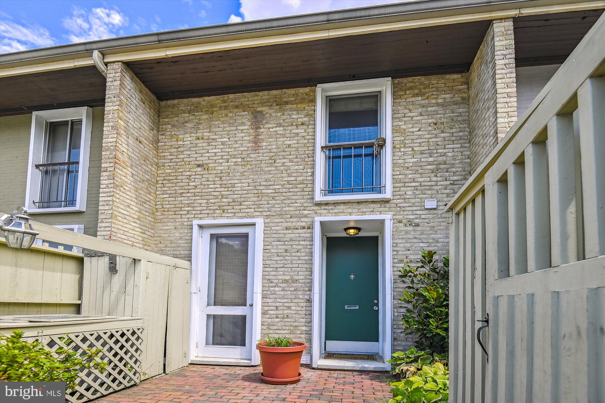 A wonderful little gem in Cross Keys is calling. Cute as a button and easy to call home - or maybe just your weekday stopover? There are options! Lovely parquet floors on first floor and hardwoods on 2nd, streaming natural light, first floor powder room and laundry - and a darling front and back patio. Water and Hot Water are included in the condo fees! Dedicated parking and the comfort of knowing you're in a gated community. Cross Keys is the next hot spot. Conveniently located with easy access to downtown or out of town. This is a great investment for now and the future.