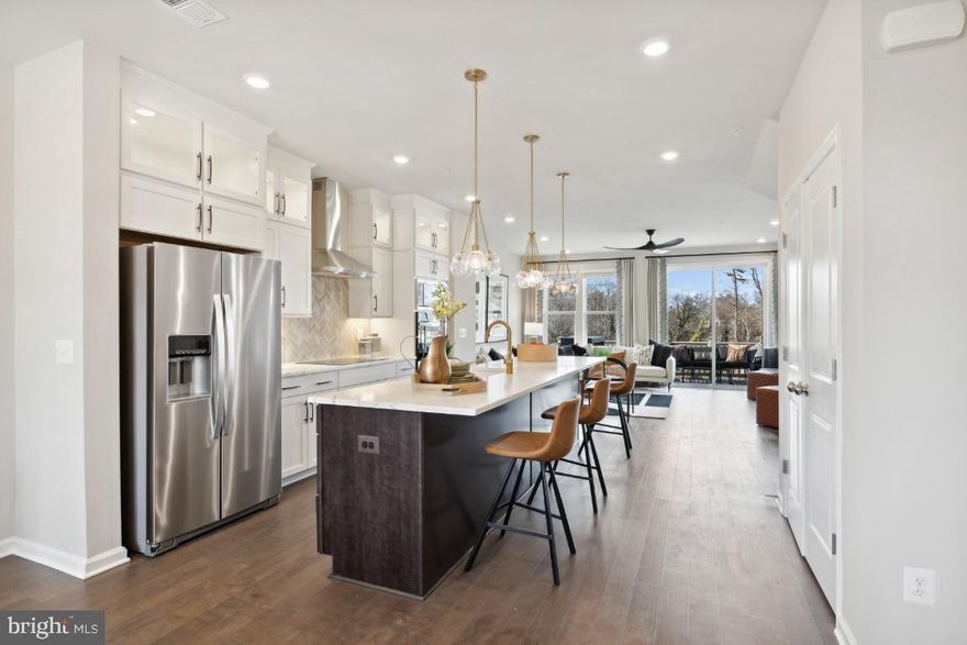 This Lot 30, is a 3-Leval 20’-wide townhome with a 4 foot extension on all 3 levels and 2212 square feet of living space. The home features a first-floor room that extends to the backyard which can be an optional fourth bedroom with full bath or a rec room for entertaining. The second level boasts a beautiful open and airy dining area, kitchen with large island, and great room space. For outdoor living, the home offers an optional deck. The upper level features a large beautiful primary suite with a large walk-in closet and gorgeous en suite; a third-floor washer and dryer hook-up; and two secondary bedrooms and another full bathroom. Photos are for illustrative purposes only