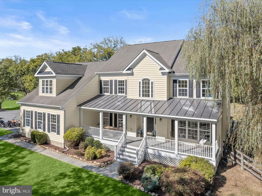 Tucked into the rolling hills of Western Loudoun, 37070 Elaine Place offers a rare blend of country living and convenience, perfectly situated equidistant between the charm of Purcellville and the sophistication of Middleburg. Whether you’re craving the small-town warmth of Purcellville’s restaurants, shops, and breweries, or the equestrian heritage and boutique allure of Middleburg, this address places you right in the heart of both worlds, while still only 25 minutes to Downtown Leesburg and The Leesburg Outlet Mall, 15 minutes to Cornerstone Christian Academy, 40 minutes to Reston and IAD, and 60 minutes to DCA and Washington DC. Enjoy DC's wine country to its fullest at Elaine Place!

Set on nearly six acres with no HOA, the property invites freedom and possibility. The home itself is generous in every sense—six bedrooms and five full baths provide space for family, guests, and multi-generational living. A thoughtful floorplan includes the option for a main-level in-law suite, while large windows and sun-kissed rooms capture views of the surrounding countryside. Hardwood floors, elegant trim, and a chef’s kitchen with an oversized island and abundant cabinetry create an atmosphere that’s equal parts comfortable and refined.

For those who dream of a place to keep horses, chickens, goats or simply enjoy wide-open land and gardening, the grounds deliver beautifully. A two-stall barn with tack room stands ready, while open pastures and neighboring trails make it easy to step into the equestrian lifestyle. Ride out directly into your own private acreage and enjoy local bridle paths, or make use of the nearby W&OD Trail for longer, scenic outings on gravel—whether for pleasure rides, trail schooling, or exploring the region. 

Life at Elaine Place isn’t just about the house, though—it’s about the lifestyle it affords. Mornings can begin with coffee on the covered porch overlooking the kids playing, afternoons with a trail ride or a trip into town, and evenings gathered with family and friends on the deck under a canopy of stars. It’s a home that balances elegance with practicality, privacy with accessibility, and everyday living with a touch of country magic.

Recent updates include a finished lower level with heated flooring, a wet bar, spa-like full bath, repainting of whole house and front porch, refinished main level hardwoods, new carpet in upper level, new flooring in upper level hall and "game room"/bedroom, new carpet on lower level stairs, both HVAC units, water softener, well pump, above ground pool and surrounding deck, front porch stairs, custom primary bedroom closet, and more!