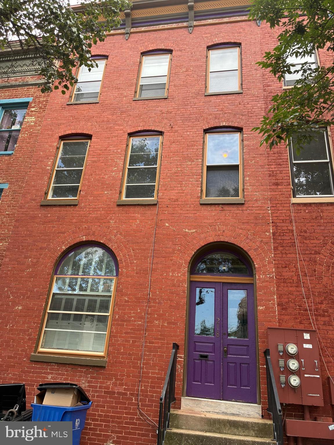 Two units in a townhouse that could easily be converted back to a single family. Unit 1 is the first floor has one bedroom. Unit 2 is the 2nd and 3rd floors - has two bedrooms and one bath, space for a 2nd bath on the 3rd floor and lots of rooms, including an enclosed porch! TWO parking spaces! Plus a hook-up for an EV