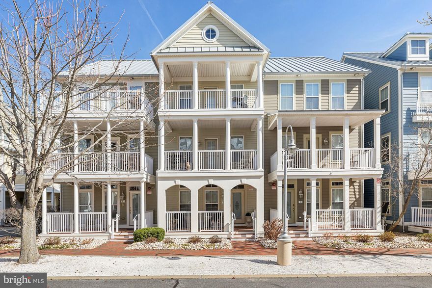 Discover Coastal Living at Its Finest in Sunset Island

Nestled on a quiet, tree-lined street in the heart of the highly sought-after Sunset Island community, this beautifully decorated townhouse is the perfect blend of comfort and coastal charm. Well  maintained, it’s being offered fully furnished—ready for you to move right in and start enjoying the beach lifestyle.

Step inside to an inviting open floor plan bathed in natural light. The modern kitchen is a chef’s delight, featuring solid surface countertops, a large island with seating, and sleek tile flooring. Adjacent to the kitchen, the spacious morning room is the perfect spot to sip your coffee and unwind with a good book. A cozy first-floor den provides flexibility as a potential fourth bedroom or home office.

Enjoy the coastal breeze from any of the three covered front porches or relax in the private screened-in rear porch. The master suite offers a spa-like retreat with a soaking tub, private balcony, and serene views. The stylish beach-inspired décor throughout creates a relaxed, welcoming vibe that you’ll love year-round.
Just steps from your door, Sunset Island’s resort-style amenities await. Take a dip in the outdoor pool, lounge at the private beaches, or explore the interactive fountain and fishing piers. The year-round clubhouse features an indoor pool, fitness center, and on-site restaurant. Stroll the scenic walking trails or stop by the Corner Store for a quick treat. With 24-hour security and a prime location close to Ocean City’s best attractions, this townhome is the ultimate coastal getaway.

Opportunities like this are rare—schedule your tour today before it's gone!