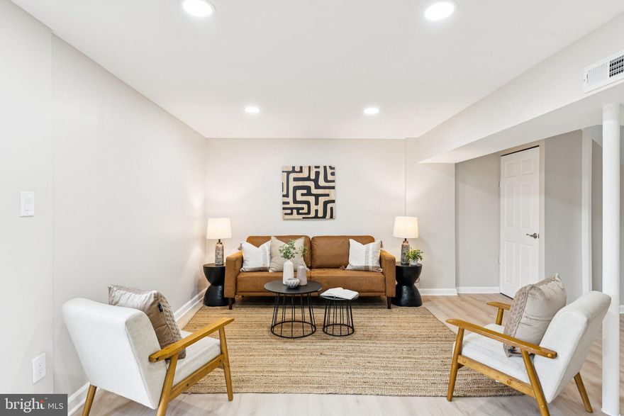 As soon as you step inside, you are greeted by bright, refreshing natural light and a home that has been renovated inch by inch. This home has OVER 45K of updates, making moving in a breeze!The brand new LVP flooring flows seamlessly through the main level, where a spacious dining room opens into a thoughtfully designed kitchen.

The kitchen features brand new cabinets, quartz countertops, subway tile backsplash, and all new appliances including GE and LG. A single-well stainless steel sink with a sleek faucet makes meal prep quick and easy.

Just beyond, the light-filled living room offers flexibility for a large sectional or a cozier seating area with space for a desk. Perched high in the neighborhood, the living room windows frame views of mature trees, and they are brand new too.

The lower level continues with fresh carpet on the stairs and LVP flooring for a clean, continuous look. A convenient half bath is tucked in the hallway, perfect for guests. Upstairs, you will find updated bedrooms with thoughtful closets, along with a beautifully renovated bathroom featuring honeycomb floor tiles, subway tile with a built-in shelf, and stylish cabinetry and lighting.

With newer windows throughout, modern finishes, and plenty of storage, this home is truly move-in ready. All the updates have been done and you will not need to touch a thing.