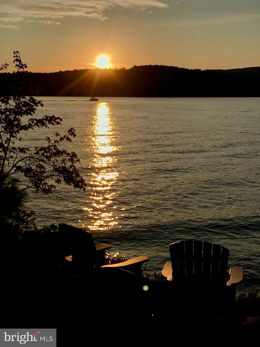 Smith Pointe in Deep Creek Lake’s Thousand Acres Community is breathtaking! Add an incredibly unique contemporary lake-style architectural masterpiece on some of the best lakefront you will ever see, and you've captured pure serenity. The home has western exposure with a front row seat for magnificent Deep Creek Lake sunsets, altogether providing the perfect mountain-lake escape. Designed to bring the outside in with an abundance of natural light from massive glass panels and an open floor plan that flows effortlessly, the home will easily accommodate large family gatherings or just a quiet weekend for two. Check off another amenity with the newly finished Thousand Acres 18-hole Golf Course.  This is an ideal location for those that enjoy the outdoors and love the majestic Appalachian Mountains. A truly special home offering an amazing quality of life in a stunning location.