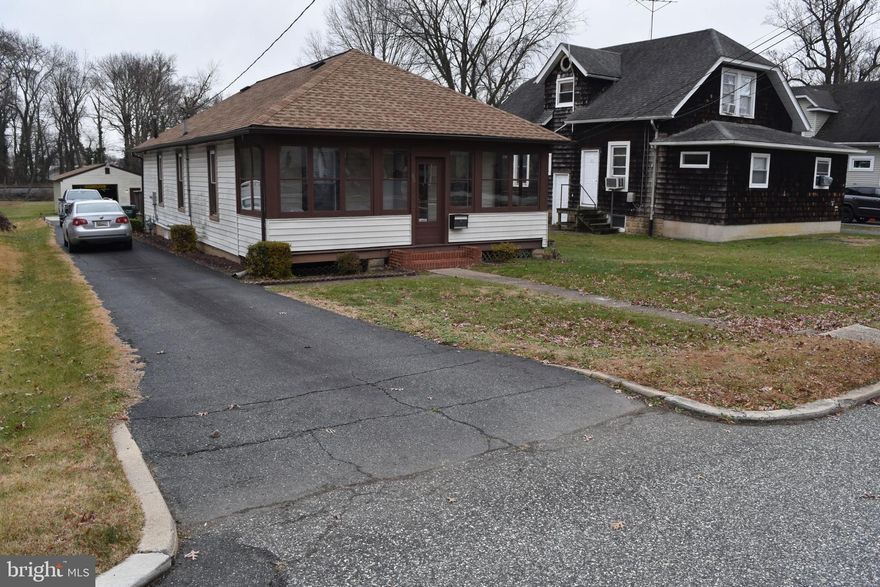 The property is to be offered for Sale at Public Auction on Friday, April 17, 2026 at 12 pm. The list price is the base assessment value and not the anticipated sale price. $ 25,000.00 Contract Deposit required. Settlement by June 1, 2026.  Frame 1-story home with updates to include gas HVAC (2020), gas water heater (2022), asphalt shingle roof (2019), aluminum gutters and fascia, replacement vinyl insulated double hung tilt-in windows, kitchen, bathroom.  The floor plan consists of a living room, dining room with a wood stove, eat-in kitchen with an entrance to the large rear deck, laundry room with a trap door leading to the utility basement, 2 bedrooms with a closet, office/study with a closet, and a full bathroom.  There is a 36' x 24' detached garage/shop with a gas warehouse heater that has not been fitted with gas service.  A garden shed sits at the rear of the large back yard. See MLS documents for detailed brochure, auction terms, and disclosures.