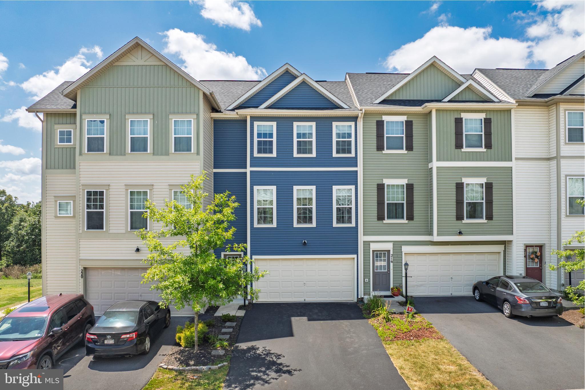 Welcome to 218 Patchwork Drive in the Ramie Corner section of the desirable Snowden Bridge neighborhood. This community offers resort style amenities including swimming pool with pirate splash park, playground, picnic pavilion, indoor sportsplex, dog park, and walking trails. Snowden Bridge also has an on-site elementary school and a day care center. This Highland model is one of the largest and this townhome includes the optional bump out, extensions and a large 2-car garage. Bonus! There is a Trex-deck and patio, fenced in back yard and one of the few properties in Snowden Bridge the backs to woods, so there are no other homes behind you.
Step into the welcoming foyer and enjoy the lower-level family room with walk-out access to the backyard, including a full bathroom with a stand-up shower. This walk-out lower level is adorned with wood barn doors, and offers additional living space, recreational space, kids play room, or gym.
The main level features the kitchen with granite countertops, pantry, and abundant cabinet space, all open to a bright dining area and sun-filled living room. Another half bath and office with French doors adds convenience on this level. Upstairs, you'll find three generous sized bedrooms, including a luxurious primary suite with two separate walk-in closets and a spa-like bath featuring dual vanities, a soaking tub, and walk-in shower. The upper-level laundry makes everyday life easier. Enjoy the benefits of a garage, paved driveway, and a vibrant community with fantastic amenities.
You won’t have to leave to have fun, but when you do, you’re just minutes from all the convenience and entertainment around Winchester. Enjoy endless local restaurants, bars, entertainment, and historical downtown Winchester. Original owners and well maintained.