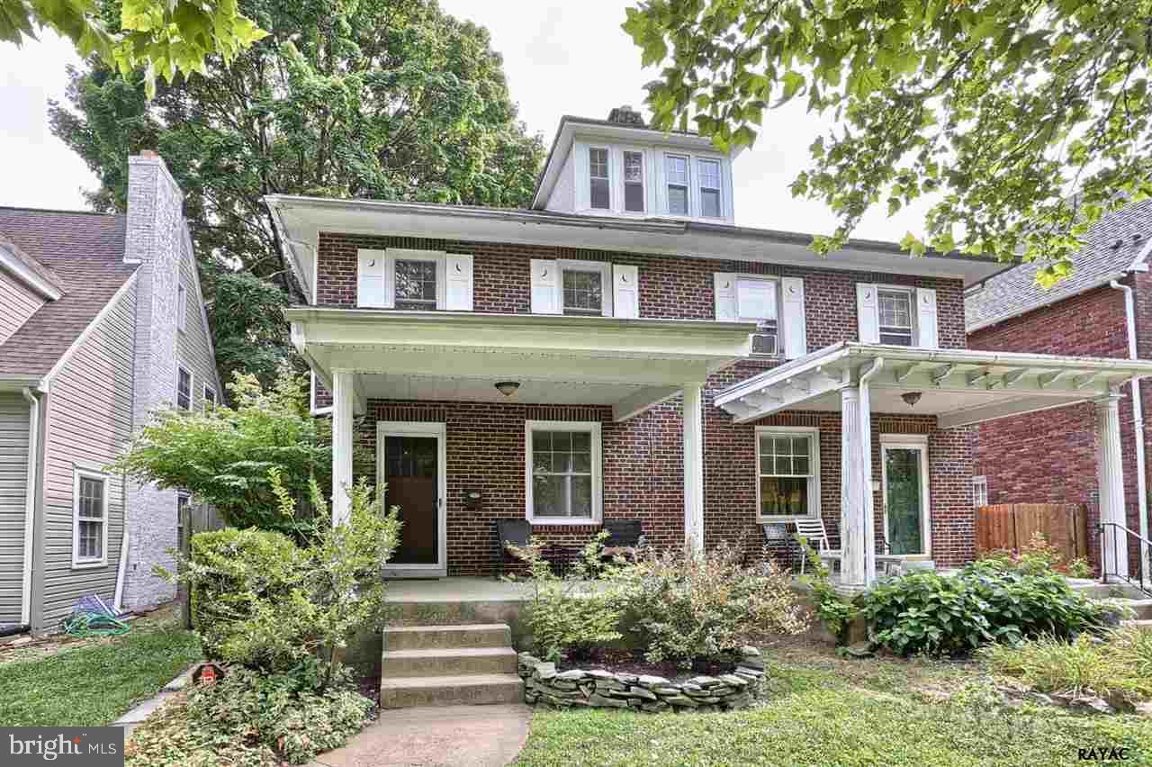 Super Nice Semi on Picturesque tree lined street. This York Suburban 4BR home features include Cozy LR w/wood burning fireplace, bright & cheery EIK kitchen w/ breakfast bar, a fabulous lower level FR with custom built bar, replacement windows. Step out back to your private fenced in yard, charming patio & 1 car garage. Just a hop skip & jump to I 83 & rt 30