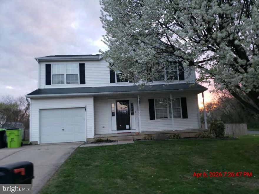 Beautiful 4-bedroom, 2.5 bath Colonial-style home featuring a charming porch front and attached garage. This well-maintained property offers a spacious layout with a welcoming family room complete with custom built-ins and a fireplace. The kitchen is equipped with granite countertops, a center island, and stylish pendant lighting - perfect for bother everyday living and entertaining. Enjoy outdoor privacy in the fully fenced rear yard. There was a water leak that caused some ceiling damage, but it has been addressed and remedied as well as an HVAC, electrical, siding and plumbing repair.