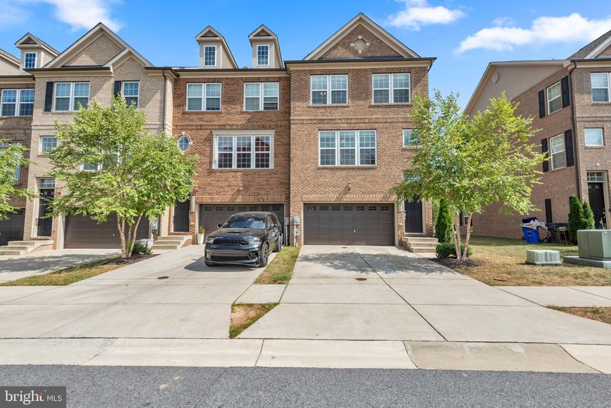 Welcome to this stunning 2019 Stanley Martin end-unit townhome — the very definition of modern luxury and convenience. Every thoughtful upgrade has been included, offering a lifestyle that is both refined and effortless.

Step inside to discover wide-plank luxury flooring, soaring ceilings, and a light-filled open layout. The gourmet kitchen is a chef’s dream with a gas cooktop, double wall oven, 42-inch shaker cabinetry, quartz countertops, and recessed lighting — all opening seamlessly to a spacious dining and family area. From here, step onto the expansive deck, perfectly positioned to overlook serene natural views.

Upstairs, the primary suite is a private retreat featuring a generous walk-in closet and a spa-inspired ensuite with double vanity, quartz counters, and an oversized shower. The convenience of an upper-level laundry room, two additional bedrooms, and ample storage space add to the home’s exceptional functionality.

The oversized two-car garage provides even more room for storage, while the home’s location in the highly sought-after Hamilton Park community in Waldorf, Maryland, offers unmatched convenience — just minutes to Joint Base Andrews, Washington, D.C., and Northern Virginia.

As an added bonus, this exceptional residence conveys fully furnished, making your move-in experience seamless.

Opportunities like this are rare — don’t miss your chance to own a home that truly has it all. Schedule your private tour today!