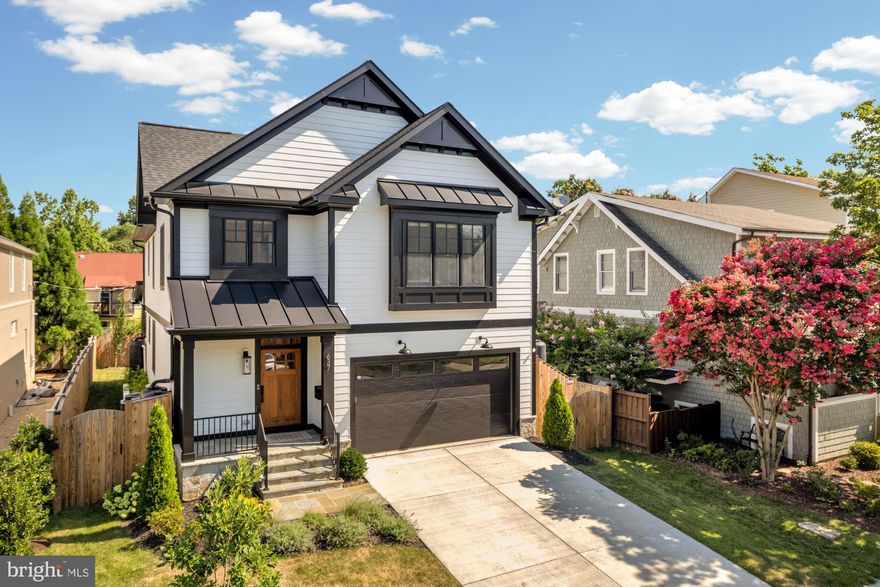 Live in one of the most vibrant and convenient locations in Arlington.  Situated on a quiet street in the highly sought-after 22202 zip code in Arlington, this luxury home (built in 2024) is just minutes from Washington D.C (zero stoplights to 395N), Crystal City, Amazon HQ2, the Pentagon and National Landing. A half mile to CC metro and just under a mile to DCA.  Thoughtfully designed and masterfully crafted in 2024 by M-R Custom Homes, this stunning 5-bedroom/4.5-bathroom residence offers over 4,500 square feet of beautifully finished interior living space across three levels.  The attached two-car garage, screened porch w/ ceiling mounted heaters, spacious patio and fully fenced yard provide an abundance of exterior living space.

Step inside to discover 9’ ceilings, wide-plank hardwood floors, refined architectural details and curated finishes throughout to elevate everyday living. The open-concept main level features a sun-drenched living room with a gas fireplace, a gourmet kitchen with top-of-the-line appliances (Wolf/Sub-Zero), quartz countertops and waterfall island.  Walkthrough the butler’s pantry to access a spacious dining area ideal for entertaining. Upstairs, the luxurious primary suite includes a spa-inspired bathroom (rough in plumbing for soaking tub) and generous walk-in closet. Three additional bedrooms reside on this level, one with an ensuite bathroom and the other two share a jack-and-jill.  A fully finished lower level, also with 9’ ceilings, offers a versatile living area with a built-in bar (including beverage fridge and ice maker), a private guest suite, and ample storage/closet space.

This rare luxury offering in the sought-after Addison Heights neighborhood of National Landing is ready for a new owner.   Tons of shopping, dining and grocery stores nearby – including Whole Foods, National Landing Water Park and 23rd Street/Restaurant Row. Walk to library, tennis courts and Virginia Highlands Park. Enjoy the perfect blend of modern living and timeless style in one of Arlington’s most vibrant and convenient neighborhoods.