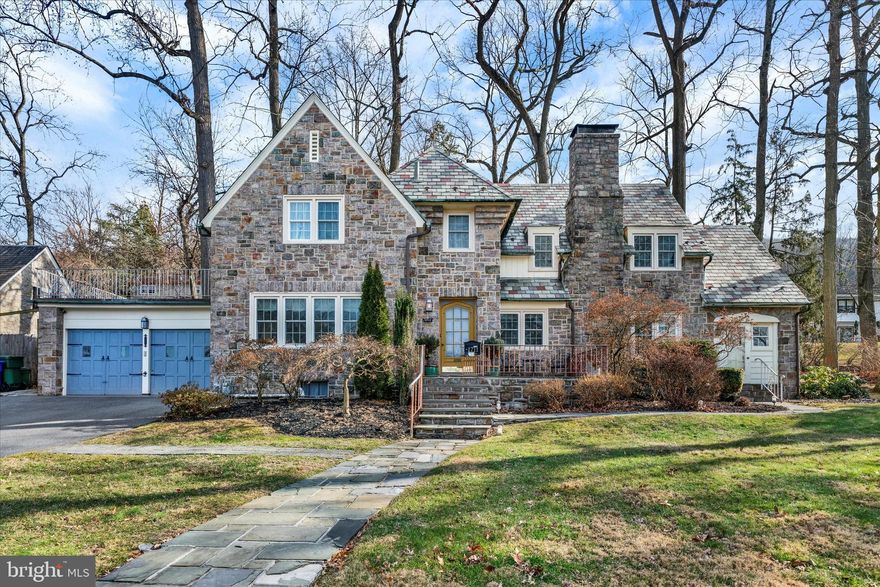 Welcome to 1711 Alsace Road, inspired in French Normandy style and located in the desirable Hampden Heights neighborhood. This stone residence offers three bedrooms, two full baths, two half baths, and a two-car garage!

The curb appeal of the flagstone path and the welcoming front porch lead you into a large foyer complete with an elegant iron staircase. The main level also boasts a formal dining room with hardwood floors, generous natural light, and charming corner built-ins. The updated eat-in kitchen includes wood cabinetry, granite countertops, tile flooring, and a stylish backsplash. The living room provides a cozy atmosphere centered around a wood-burning fireplace, while an adjacent three-season room adds personality with its stone floors and exposed stone wall. A convenient half bath completes the first floor.

Upstairs, the master bedroom offers a spacious layout, a walk-in closet, and a private bath. Two additional bedrooms and a full hall bathroom complete the second level. A pull-down staircase accesses ample attic storage with spacious cedar closets.

The finished basement expands the living space with a versatile rec area, a wet bar, and an additional half bath. Outside, the backyard is designed for easy enjoyment with a patio and outdoor fireplace, ideal for gatherings or quiet evenings.

Additional highlights include replacement windows, a recently soft washed slate roof, and efficient gas heating. This home is situated in a convenient location close to local amenities, schools, dining, and community attractions.

A wonderful opportunity to own a classic stone home in a well-loved neighborhood

Schedule your private showing today!
