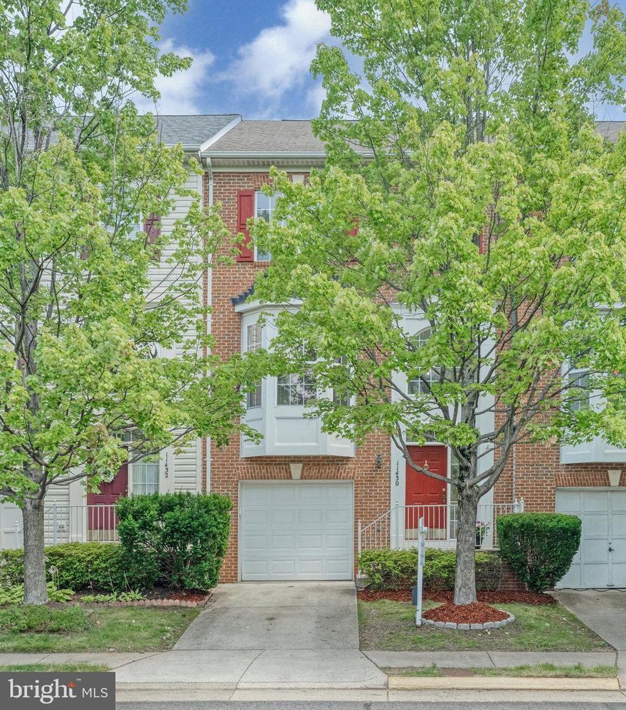 Beautiful, Bright, and Spacious. This luxury 3-level brick front townhome is in the desirable area of Fairfax (Fairfax Corner). Extremely well maintained including new carpet and fresh paint! The home features 3 bedrooms and 2 full bathrooms with an additional 2 half baths (One on the main level and the other in the basement). One car garage, 1 car driveway, and visitor parking directly across. Open floorplan, with 9' + high ceilings, maple hardwood floors, and crown molding. On the main level, you will find an Eat-in Kitchen w/ SS appliances, tall cabinets, granite countertops, and a deck off the breakfast room. Upstairs you will find an expansive Master suite that details vaulted ceilings, a walk-in closet with shelving, an updated bath w/ shower, a soaking tub, and double vanity. The second full bath has been fully updated and leads to the secondary and third spacious bedrooms. The lower level hosts a family room, half bath, gas fireplace, laundry, and more storage. Private two-level deck with walkout from kitchen and basement. The home has multiple closets and storage throughout. Quiet lot within the community. Amazing location with walking trails to Wegmans, Fairfax Corner (minutes away!) Fair Oaks Mall, FFX Towne Center, Vienna Metro, and more are nearby. Hop onto I-66, 50, and 29 and Fairfax Parkway in just minutes.