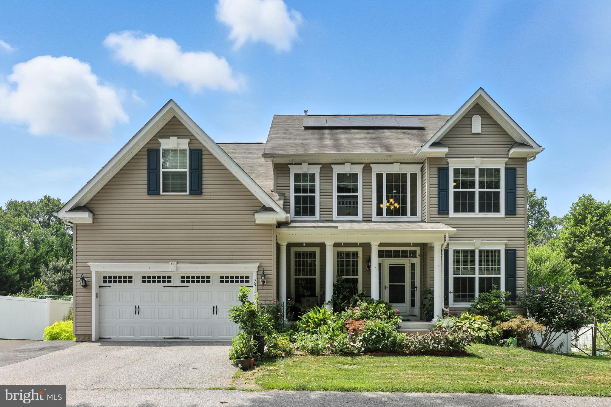 Welcome to 7911 Burkard Lane, a stunning five bedroom, three full bath Colonial in the sought-after Mission Ridge community of Jessup, Maryland. Built in 2015, this 3,188 sq ft home offers an open, light-filled layout with a cozy fireplace, modern kitchen, and spacious bedrooms, plus a fully finished 1,466 sq ft basement perfect for a rec room, gym, or guest space. Situated on a generous 0.31-acre lot, the property boasts a low-maintenance vinyl exterior, a two-car garage, and a beautifully landscaped yard. Enjoy year-round comfort with central A/C, natural gas heat, and public utilities, all in a prime location near top-rated schools, commuter routes, and local amenities. Move-in ready, this home blends timeless charm, modern upgrades, and exceptional value in one perfect package!