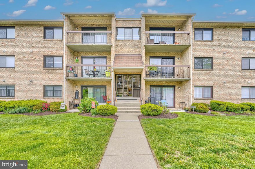Beautifully maintained top-level 2-bedroom, 2-full-bath condo offering spacious, low-maintenance living in a peaceful setting. A secure entrance with intercom access in each unit provides added convenience. Inside, a bright and spacious living room with adjacent dining area welcomes you, featuring sliders to a private balcony—perfect for morning coffee or evening relaxation.

The roomy kitchen has been updated with newer appliances, including a brand-new stove, granite countertops, and stylish cabinetry. The large primary suite offers a generous layout, walk-in closet, and private full bath. The second bedroom is also well-sized with two large closets and a full bath just steps away—ideal for guests, a home office, or extra storage.

Additional features include a laundry room off the main hallway, fresh paint, newer carpet, window blinds, a separate lower-level storage space, and plenty of parking. Conveniently located near shopping, dining, and major commuter routes, with quick access to I-695 and I-95. Comfort, convenience, and easy living in a prime Catonsville location!