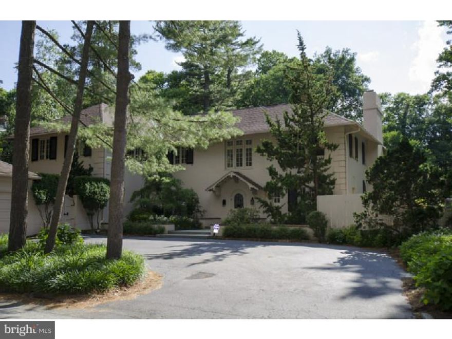 Welcome to this palatial home on Glenn Road in North Side Ardmore! What could be better than living in a charming 93 year young architecturally interesting home in move-in condition? Park in your court yard and enter this fabulous home featuring a large beautiful living room, dining room, large enclosed family room with arched doors overlooking spectacular grounds with pool and tennis court. The country kitchen is amazing in size with all new appliances and granite island. The hardwood floors and views of the outdoors are amazing. This home has to be seen to be appreciated. Mere words won't do it justice. Off the hallway is a separate pool room with a full bath and outside entrance to the private pool. The mud room off the kitchen leads into the laundry room. Six large bedrooms are all on the second floor along with 4 baths. (Three of which are brand new) full staircase to floored attic. On the lower level is a movie room and play room. This grand home is within walking distance to Suburban Square, trains and great shopping.