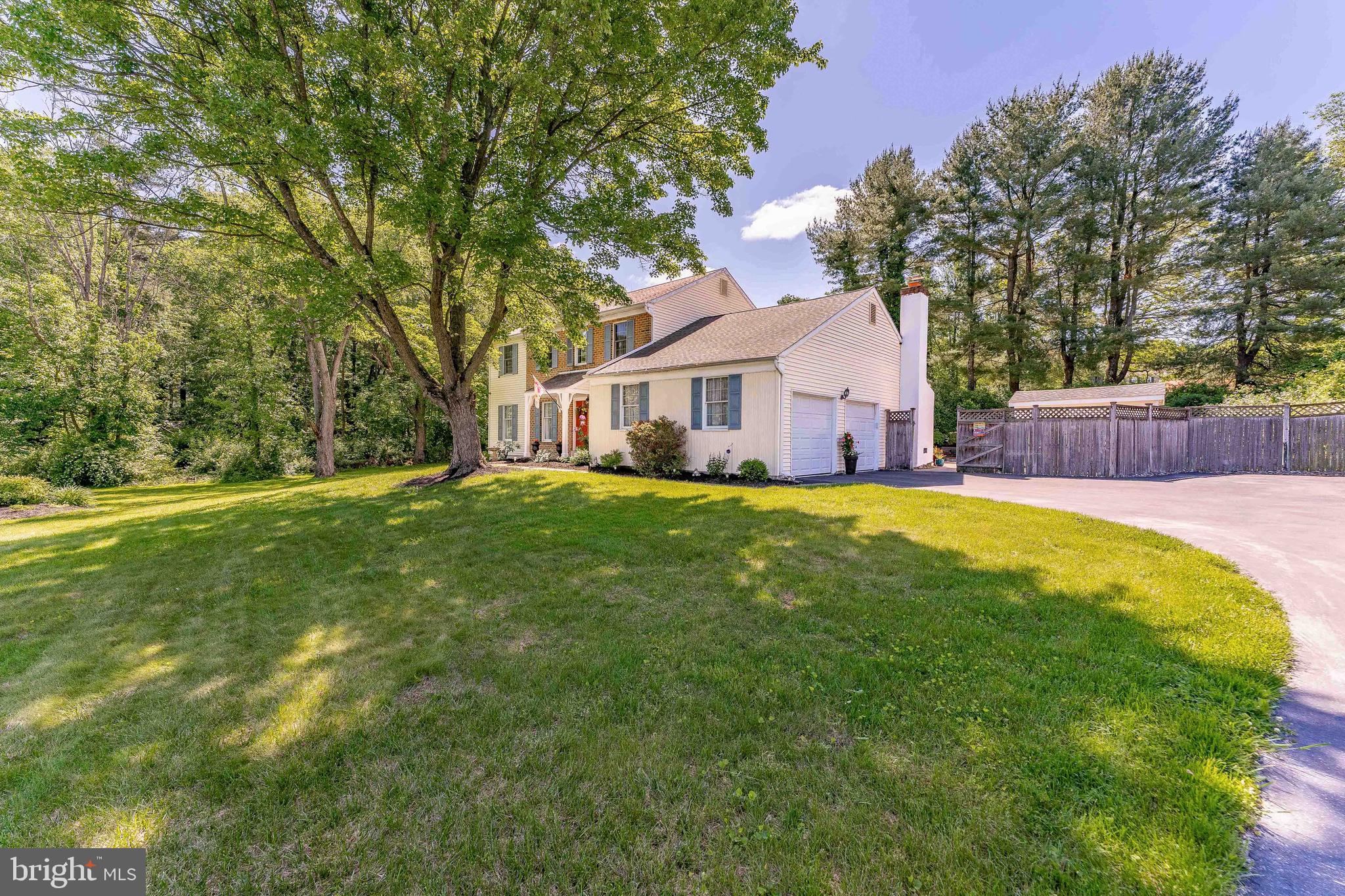 Welcome to 127 Timber Springs Lane — a spacious and beautifully maintained 4-bedroom, 2.5-bath Colonial home located in the desirable Timbers neighborhood of Exton. As you arrive, you're greeted by a large 6-car driveway and an attached 2-car garage, offering plenty of parking for residents and guests alike. Step inside to a warm and inviting foyer featuring hardwood floors and a stylish ceiling light. To the left, the living room offers a cozy space with plush carpeting and leads seamlessly into the formal dining room, complete with hardwood floors, a bow window, and elegant ceiling lighting — perfect for gatherings and special occasions. The heart of the home is the well-equipped kitchen, boasting hardwood floors, a tray ceiling, ceiling fan, and a suite of quality appliances including a GE Radiant range, GE over-the-range microwave, KitchenAid dishwasher, LG French door refrigerator, and a pantry for extra storage. Adjacent to the kitchen is a sunny breakfast room with hardwood floors, chair rail detailing, a ceiling light, and a charming bow window. The nearby laundry room includes vinyl flooring, a utility sink, stacked Whirlpool front-load washer and dryer, and direct access to the backyard. The family room is a showstopper — featuring hardwood floors, a semi-vaulted ceiling with exposed beams, a ceiling fan, skylight, built-in cabinetry, and a cozy wood-burning fireplace. French doors open to your private backyard oasis, where you'll find a patio, in-ground pool with a new pump and filtration system, storage shed, and beautifully landscaped gardens with hummingbird favorites like trumpet vine, salvias, honeysuckle, Rose of Sharon, azaleas, and more — ideal for entertaining or unwinding in nature. A powder room with tiled flooring is just off the foyer for added convenience. Upstairs, the spacious primary bedroom offers carpet flooring, a ceiling fan with light, and a walk-in closet. The en-suite bathroom includes tile flooring, a double-sink vanity, and a walk-in shower. Three additional bedrooms — all with carpet floors and two with ceiling fans — provide flexible space for family, guests, or a home office. A full hall bathroom with tile floors and a tub/shower combo completes the upper level. There’s even more space to enjoy in the finished basement, which includes carpet floors, chair rail detailing, and houses the home's sump pump and radon mitigation system. For added convenience, the attic features pull-down stairs and a ceiling fan with a light — perfect for additional storage. This home also has a brand new HVAC system installed in 2024. Located just off N Pottstown Pike, this home offers easy access to grocery stores, restaurants, shopping, and other local amenities. Plus, with quick access to I-76, commuting is a breeze. Don't miss your opportunity to call 127 Timber Springs Lane your new home — it has everything you need and more!