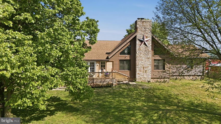 OPEN HOUSE SATURDAY, MAY 9TH FROM 11AM-1PM.***Motivated Seller***New price, new pictures, you could be the new owner!!Turn-key horse property meets resort-style living in this fabulous custom-built log home set on over 5 acres of land with mountain views. Spend your mornings in the saddle and your afternoons by the saltwater in-ground pool (installed 2020), all in a setting designed for both everyday function and unforgettable gatherings.

The equestrian facilities are established and in active use. The property features a 90 x 70 riding arena positioned in front of the pole barn, 65’ round pen, a 39’ x 41’ pole barn with electric and water including feed room, tack room and hay storage, plus an additional 4-stall horse barn with electric and water. Property also hosts a chicken coop and duck area, goat pen with shelters, and a fenced area for household pets in the front of the home. In addition, a complete electric fence surrounds most of the property.

The kitchen is the heart of the home with custom cabinetry, stainless steel appliances, and generous counter space for cooking, seating, and entertaining. Enjoy immense storage, slide-out pantry space, and an additional eat-in area, currently styled as an office and coffee bar. Just off the kitchen, you will find a seasonal sunroom/enclosed porch filled with lots of natural light and beautiful views.

The great room delivers the wow factor with cathedral ceilings, exposed rafter beams, and a dramatic wood-burning floor-to-ceiling stone fireplace. Upstairs, the loft-level bedroom, currently used as a game room, overlooks the open and airy great room below.

An oversized primary suite featuring a walk-in closet and a private en-suite with a unique custom-tiled walk-in shower and separate soaking tub. Another main-level bedroom and a second full bath offer flexibility. The second bath features a walk-in shower and convenient dual access from both the kitchen and the second bedroom.

Everyday function is built-in with a main-level laundry room, and the convenience of central vacuum! The lower level offers a finished flex space ideal for a den, playroom, gym, or media lounge, plus over 2,000 sq ft of unfinished storage divided on both sides of the finished area, plus a second washer and dryer. Find in lower level a radon remediation system, water softener, and UV water purifier. An oversized detached garage adds even more flexibility, with an electric vehicle charger, 50 amp RV hookup, and an attached finished office or work space with high-speed commercial internet. Ideal for hobbies, a studio, or a home-based business. Private shooting range on property.

A rare combination of proven equestrian function and staycation-worthy outdoor living, all in a beautiful mountain-view setting. Schedule your tour today!
