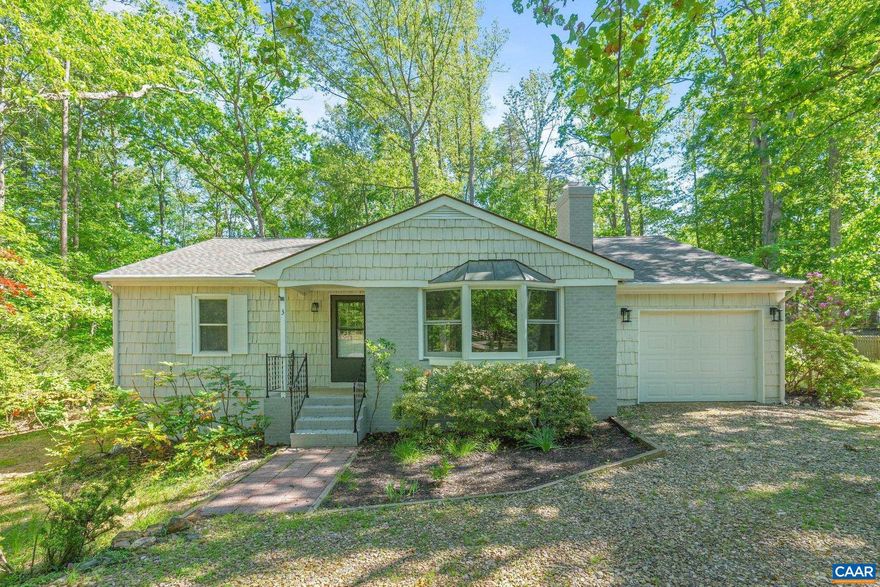 Come see this beautifully renovated home at Lake Monticello.  This home features three bedrooms and two full baths. Upon entering, you will love the foyer that leads to a large living room complete with built-in cabinets, bay window and a wood-burning fireplace. Off the living room is the dining room and kitchen featuring white painted cabinets, new stainless steel appliances, and Corian countertops. The dining room also includes a new sliding glass door that opens onto a new deck.  The layout includes two bedrooms and one full bath on one side of the home, with the bathroom offering an oversized double vanity and a linen closet. The master suite features a new sliding glass door leading to the deck and a beautiful bathroom with a tile shower with a rain feature, glass door, a new vanity, and a linen closet.  The interior and exterior were freshly painted last year, and several updates were completed in 2025, including new heat pump,  luxury vinyl plank flooring, light fixtures, vanities, and tile shower.  New roof installed 2026. This home sits on one of the most level lots at Lake Monticello with a fenced in backyard and circular driveway.  One car garage is perfect for storage. Owner is a licensed real estate agent in Virginia.,Solid Surface Counter,White Cabinets,Wood Counter,Fireplace in Living Room