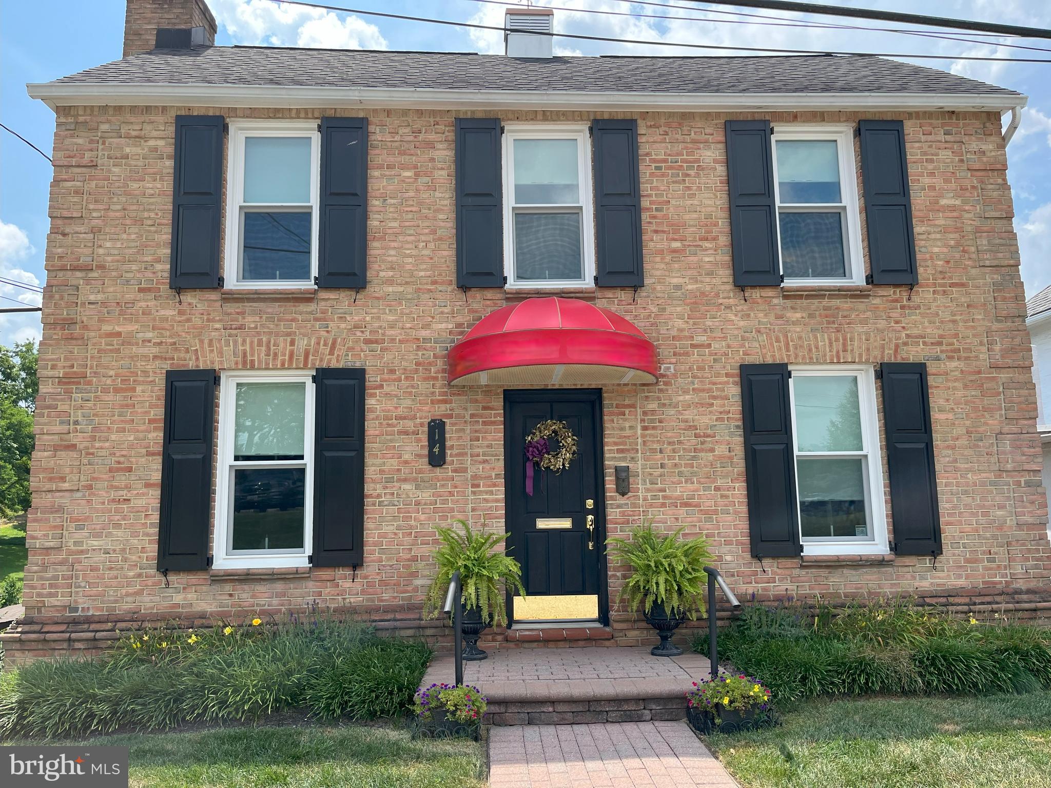 Don't miss out on this rare opportunity to own a beautiful brick home in the heart of Mt. Airy's downtown district. Currently being used as an office, but can be converted back to a residential unit with 2 bedrooms, a living room, and a space to add a kitchen. This property also features a basement for storage as well as a usable attic space. The interior provides unique aesthetics, as there is a non-functioning brick fireplace and hardwood floors throughout. The lovely lot offers an open exterior space and room to add on. Although there is street parking, the municipal parking lot is just across the street, which offers several public spaces and EV chargers. This space can also be kept as a commercial office if desired. Located near shopping, restaurants, and is close to commuter routes, don't wait to see this perfect property!