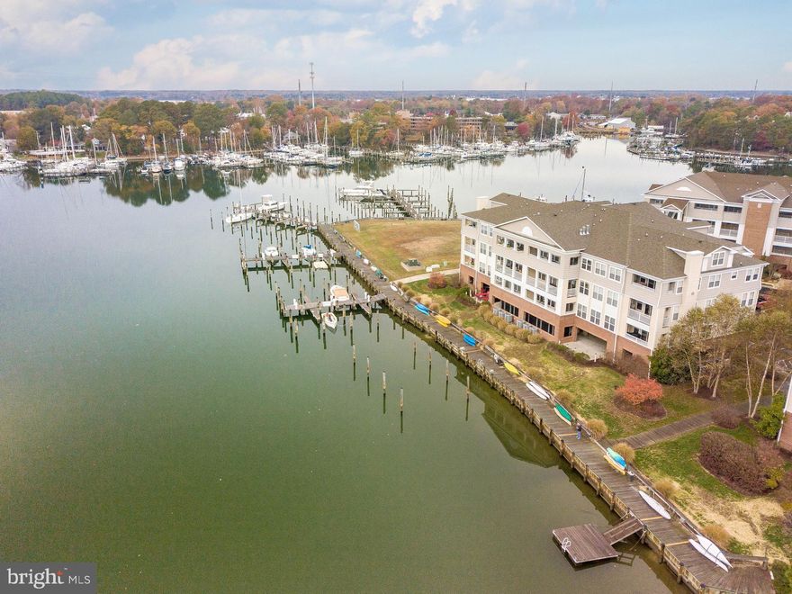 Waterfront Top Floor Condo looking at Back Creek and Solomons Island. 3 Bedrooms and 3 Full BathroomsDeep water deeded boat slip, Dock F slip 8. Wake up to a beautiful Sunrises as the Condo faces East.  Community Clubhouse, Swimming pool ,Tennis and Pickleball Courts. Minutes to the Patuxent River and the Chesapeake Bay!