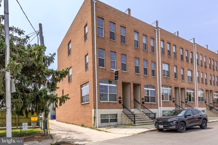 Welcome to 3911 Fleet St., an impressive end-of-group townhome located in the heart of Baltimore! This beautifully upgraded home offers a perfect blend of modern comfort and stylish living, ideal for anyone looking for space, convenience, and a touch of luxury.

Step inside and be greeted by an inviting open floor plan that effortlessly flows from room to room. The spacious family room, complete with a cozy fireplace, sets the scene for relaxation and entertaining. Gorgeous hardwood floors stretch throughout the entire home, adding warmth and elegance to every step.

The gourmet kitchen is a true standout, featuring sleek stainless steel appliances, upgraded finishes, and a large center island that’s perfect for hosting family and friends. Whether you're preparing a casual meal or crafting a culinary masterpiece, this kitchen is designed to inspire. The island doubles as a breakfast bar, making it a versatile hub for both dining and socializing.

 The upper level features a private balcony—an ideal spot to enjoy your morning coffee or unwind in the evening with a good book.

Parking is a breeze with the convenient two-car attached garage, offering secure and easy access to the home. As an end-of-group townhome, this property enjoys added privacy and ample natural light, giving it a bright and airy atmosphere throughout.

Located in a vibrant Baltimore neighborhood, 3911 Fleet St. offers easy access to local shops, dining, and entertainment. Whether you're exploring nearby parks or commuting to work, this home’s prime location makes it all possible.

Don't miss your chance to make this remarkable townhome your own! Schedule a showing today and experience the perfect blend of style, space, and convenience.