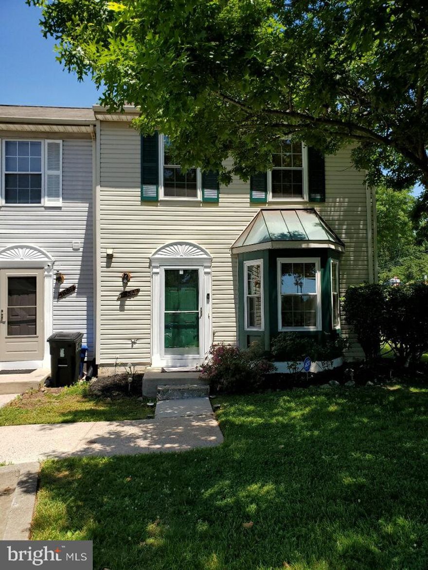 End unit town home in sleepy Hyattsville community.  This home has been freshly painted and carpeted.  It features a  large fenced in back yard.  The main level has an open living room dinning room combination.   The owner's suite boast vaulted ceilings and an en suite bathroom.  The large living room walks out to the back yard.   Close to the Metro, DC, and Fort Meade.