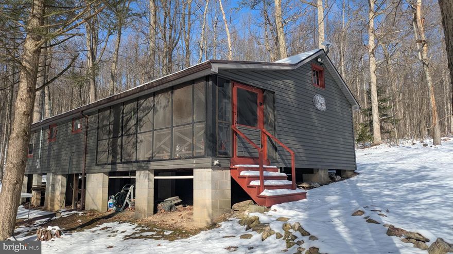 Cabin on  Rothrock State Forest Land, furnished, mini split - heat and cooling, and wood heating, inside shower, 1144 sq.ft., see documents for more info.   During  winter weather must use chains on vehicle to view.