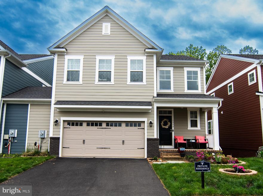 **Reduced** Rent is now only $3975! Rent includes a $200 HOA Fee and all of the benefits of Potomac Shores! Beautiful Villa-style home in beautiful Potomac Shores.  All the upgrades you can imagine, engineered hardwood floors, Stainless steel appliances, upgraded closet organizer, fireplace in the living room, granite counters, you name it.  Main-level living, with the owner's bedroom suite on the entry level.   It also has a Loft  Living area on the second level surrounded by three bedrooms.  Full finished walkout basement with lots of light and storage.  The basement has a full bath and lots of room for entertaining. Deck and Patio back to woods. Large 2-car garage.  The Potomac River is a 3-minute walk away.  The community is built around a Jack Nicklaus Signature Designed, 18-hole Golf course. Tidewater Grill is available for those relaxing days when you just don't want to cook. A huge social barn for entertaining guests, or just attending one of the events sponsored by Potomac Shores. Fully equipped gym and swimming pools for those hot summer days. Trails are around the community for you to enjoy the spectacular views. VRE and town center are to be completed soon. The seller reserves the right to retain a smaller storage space in the basement for personal use. Don't let out the super friendly cat! Will be put in a crate during showings.