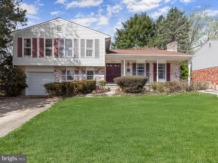 Welcome to this beautifully maintained colonial, ideally situated on a generous lot in the desirable Coachford neighborhood of Lutherville-Timonium. With timeless curb appeal, a brick and vinyl exterior, and a welcoming front porch perfect for relaxing, this home offers comfort, space, and versatility.  Step inside to a spacious main level featuring elegant picture and crown molding, gorgeous honey-toned hardwood floors, and a cozy wood-burning fireplace in the formal living room. The adjoining formal dining room exudes charm with box wainscoting, chair rail, and crown molding—ideal for hosting intimate dinners or festive gatherings.  The kitchen offers stainless steel appliances, electric cooking, a pantry, a double sink, and plenty of space for a breakfast table—ready for your personal touch to create the kitchen of your dreams.  Retreat to the spacious primary suite, where hardwood floors continue, complemented by a walk-in closet, cozy sitting area, and an en-suite bath with a walk-in shower and ample counter space. Three additional upper-level bedrooms and a full hall bath provide plenty of space for family or guests.  The fully finished lower level features a large family room with built-in bookcases, plush carpet, and a second wood-burning fireplace with a charming brick surround. Walk out to a fenced rear patio and expansive yard—perfect for outdoor entertaining. The lower level also includes interior access to the one-car garage, a bright home office or optional bedroom, a powder room, and stairs leading to the utility, laundry, and storage areas.  Conveniently located near major commuter routes including I-695, I-95, and I-83, offering easy access to downtown Baltimore and beyond.  Don’t miss this opportunity to own a spacious, character-filled home in one of Baltimore County’s most sought-after communities!