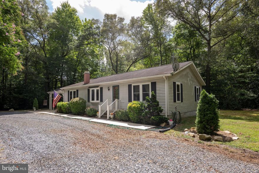 MULTIPLE OFFERS RECEIVED. ALL OFFERS DUE BY TUESDAY 9/9 AT NOON. Are you looking for 2 dwellings on a large parcel with a  large detached garage?  Welcome to 11117 Bell Rd. A well taken care of rancher has 3 bedrooms and 2 full bathrooms with 1330 SQ/ FT of living space, propane heat and a whole house generator. A carport is attached to keep the weather off of your car. There is also a mobile home in the front of the property that has 2 bedrooms, 2 bathrooms and is 970 SQ/FT of living space with a screen porch and parking for 6 vehicles. There's also a large shed with electric. The detached 2 car garage has cement floor, electric and insulation with drywall. There is a large heated workshop/ crafting room in the back of the garage. New AC in main house 7 years old, garage door openers replaced 2 years ago and newer replacement windows and doors. This is the perfect spot to move if you are looking to have parents or children close by but not living in the same house. It would also be a great spot to live in one of the dwellings and rent the other out for additional income! Seller is offer a 1 year warranty as well. The main house has a sound roof but needs replacement. Here's your country spot close to Ocean City and Berlin! Inspections are welcome, however, this is an estate sale and being sold as-is.            The good life awaits and after all.... You Deserve It!