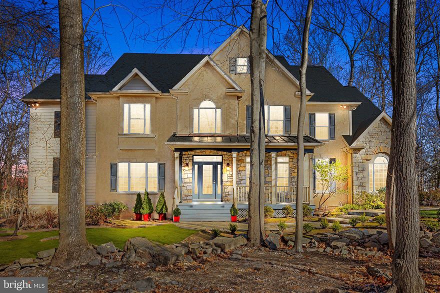 Welcome to 3216 Aquetong Road, a beautiful custom built 5-bedroom, 3.5-bathroom home nestled in the charming town of Solebury, Pennsylvania. This lovingly maintained property offers an exceptional blend of modern luxury, spacious living, and timeless appeal on over an acre of land. A stone walkway leads to the charming front porch welcoming you and offering a peaceful place to relax and enjoy the scenic surroundings. Upon entering the home, you're greeted by a bright, airy two-story foyer that leads to the expansive open-concept design of the main living areas. Gorgeous hardwood floors flow seamlessly throughout the first level, providing a sense of warmth and elegance. The layout effortlessly connects the kitchen, living, and great rooms, making it an ideal space for both everyday living and entertaining. The ample dining room and formal living room provide you with serene views of the front of the property. The newly renovated kitchen is a culinary enthusiast’s dream, featuring pristine quartz countertops, abundant cabinetry with ample storage,  top-of-the-line stainless steel appliances and eat-in dining area surrounded by bay windows. Whether preparing a family meal or hosting a gathering, this kitchen offers both style and function. The spacious great room is the heart of the home with a stone gas fireplace, floor to ceiling windows, powder room and slider that opens out to the rear yard and multi-level Garapa Gold hardwood deck. Adjacent to the great room, you'll find the conservatory with custom built-ins, which could be a perfect home office, library, or media room. A mudroom with access to the 3-car garage finishes out the first floor and adds to the overall fantastic layout of this home. Ascend the stairs to the second floor where the hardwood floors continue and discover the catwalk overlooking the great room with gorgeous views of the backyard. Your retreat awaits you, as you enter the primary bedroom offering a spacious layout, large windows, high ceilings with a trey feature, and new carpeting. The newly renovated en-suite bathroom is a spa-like sanctuary with a large glass-enclosed shower, dual vanities, water closet, linen closet, and a freestanding soaking tub that invites relaxation. A spacious walk-in closet offers ample storage and organization and completes this amazing space. Four additional, generously-sized bedrooms, each offering ample closet space and beautiful views of the surrounding property, share two Jack-and-Jill bathrooms, providing both privacy and convenience. The laundry room is located next to the back staircase leading downstairs to the kitchen and additional access to the rear yard. Take the stairs to the basement and discover a finished bonus room and workshop, plus endless potential for a home theater, playroom, or gym, with slider access to the backyard for seamless indoor-outdoor living. The expansive backyard is ideal for gardening, recreation, or simply unwinding in a peaceful, natural setting. Additional features of this exceptional property include new roof, two heating/cooling zones, water softening system, and a backup breaker panel for a portable outside generator, ensuring comfort and convenience throughout the year. Located close to the award-winning New Hope-Solebury Schools, the vibrant river towns of New Hope and Lambertville, and the bustling town of Doylestown, 3216 Aquetong Road offers the perfect balance of privacy and accessibility. With easy access to Philadelphia (just an hour away) and Manhattan (only 90 minutes), this home is ideally situated for both tranquility and convenience. The area's renowned cultural, dining, and recreational offerings further enhance the appeal of this incredible property. A true Solebury gem, schedule a tour today to experience the luxury and charm that awaits you at 3216 Aquetong Road.