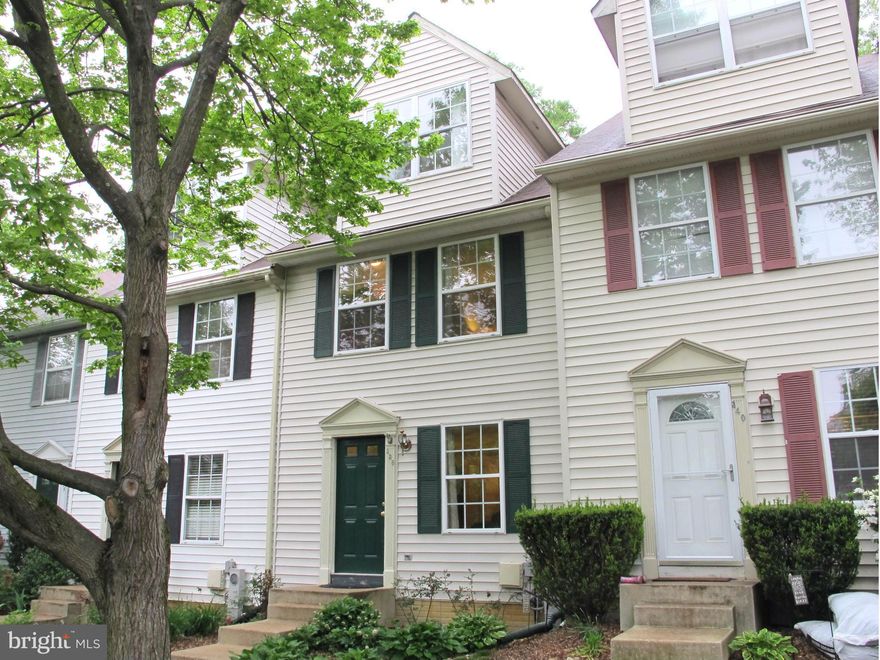 Rarely available 4 level town home offering over 1900 square feet of finished living space.  Open living and dining area offers great entertaining space.  Updated kitchen offers tons of storage space.  Huge master suite on the top level with walk-in closet and sitting area.  Large deck and yard backing to woods.  New flooring main level and new roof in 2013.  This home shows beautifully.