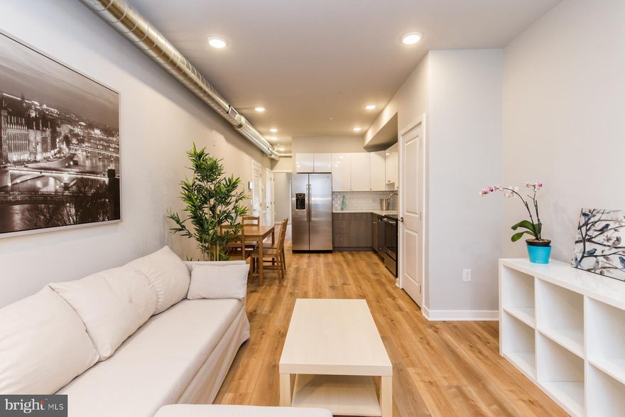 Available Mid-March | Leasing special for all units: $50/month off for 24-month lease terms You'll love this gorgeous, sunny unit as soon as you enter! Walking distance to Temple University Hospital and the Huntingdon Station for the El, this lovely space is one of the new construction apartments in this contemporary style building in Kensington. Start the tour at your private entrance, and head up the entryway stairs to the open concept living/dining space. Hardwood floors, exposed spiral ductwork, recessed lighting, and a sleek kitchen with stainless steel appliances and white quartz countertops complete this space. Continue back through this straight-through floorplan, and you'll find the full bathroom with modern fixtures and finishes, laundry closet with stacked washer/dryer, and finally, the spacious bedroom. There's high ceilings, a large closet, and sliding glass doors to your private deck out back! Schedule your showing today! Note: photos are examples from the adjacent building. Exact layout and finishes may differ.Generally, first month, last month, and one month security deposit due at, or prior to, lease signing. Other terms may be required by Landlord. $45 application fee per applicant. Pets are conditional on owner's approval and may require an additional fee, if accepted. ($500/dog and $250/cat). Tenants responsible for all utilities: $45/month flat water fee, electricity, cable/internet.