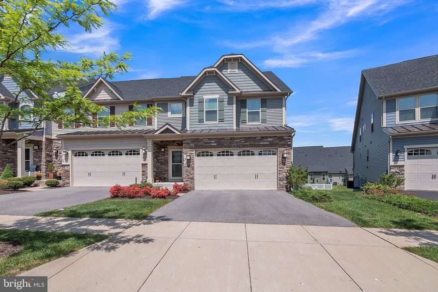 Welcome home to this 3 bedroom, 3.5 bathroom end-unit townhome in sought-after Brunswick Crossing! This home is move-in ready and boasts a variety of updates and features including 3 new storm doors, a new microwave, new paint throughout the entire property (including the 2-car garage!) and a whole-house air treatment system to keep the air fresh throughout. The large garage comes with newly-installed shelving, making it the perfect answer for your seasonal storage needs. When you enter this home you will immediately notice the generous amount of space that is accentuated by the arched door frames and vaulted ceilings in the living room area. The living room boasts abundant natural light from the floor-to-ceiling windows and a cozy gas fireplace for chasing away the chill on cold winter nights. Double french doors lead you to the stunning trex deck - the perfect spot for outdoor entertainment! Adjacent to the living room is the formal dining room with hardwood floors which leads to the beautiful kitchen. This kitchen comes equipped with recessed lighting throughout, stainless steel appliances and an island bar with pendant lighting overhead - giving you plenty of countertop space for meal preparation. Retreat away to the primary bedroom, conveniently located on the main level. You will love the private en-suite bathroom that comes with a walk-in shower and double-sink vanity. A spacious walk-in closet completes the getaway experience. On the upper level you will find two bedrooms and a full bathroom, including a bonus room/loft space that looks out over the living room below.The lower level has brand-new carpet and provides ample space to use as an in-law suite with its own full bathroom, recreational room and more! Community amenities include pool, rec center, walking trails, soccer fields, tennis courts, community garden area, RV storage area, tot lots and more! Conveniently located only minutes to commuter routes and MARC train. Don’t miss the chance to make this home yours!