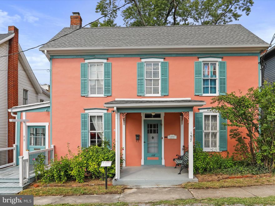 Welcome to 157 Congress Street, a timeless gem nestled in the historic town of Bath, just steps away from all that Berkeley Springs has to offer. Circa 1870, this beautifully preserved home underwent a significant renovation in 1920. Upon entrance you'll be greeted by rich wood floors that flow throughout the home, adding warmth and character to every room. The home comes furnished and offers a perfect blend of antique and contemporary decor. The attic has been finished and serves as a versatile recreation room. Living at 157 Congress Street means being at the center of Berkeley Springs vibrant community. Enjoy easy access to local attractions, including historic sites, Cacapon State Park, and Berkeley Springs State Park. Indulge in the town's boutique restaurants, explore nearby hiking and fishing spots, and immerse yourself in annual events like the Apple Butter Festival and the Berkeley Springs International Water Tasting. With Washington, D.C., just a two-hour drive away, this home offers the perfect blend of small-town charm and city convenience. Whether you're seeking a weekend retreat or a full-time residence, 157 Congress Street is a rare opportunity to own a piece of history in a picturesque setting. Don't miss your chance to make this property your own!