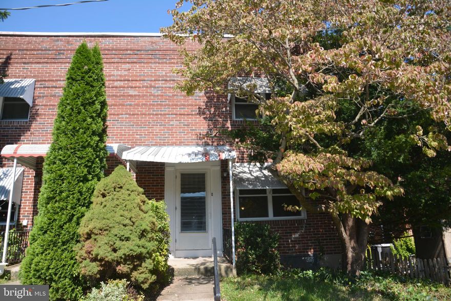 Nice West End two story end unit! This home has hardwood floors throughout and economical gas heat and cool central air too! Large Living and Dining Rooms, kitchen walks through to access to the the covered rear patio and fenced backyard. with grass alley access. The basement has an outside entrance and houses the HVAC and laundry plus lots more room for storage or rec room. Upstairs are two bedrooms and the bath. Windows have been replaced throughout. Great first time homeowner or investment opportunity!