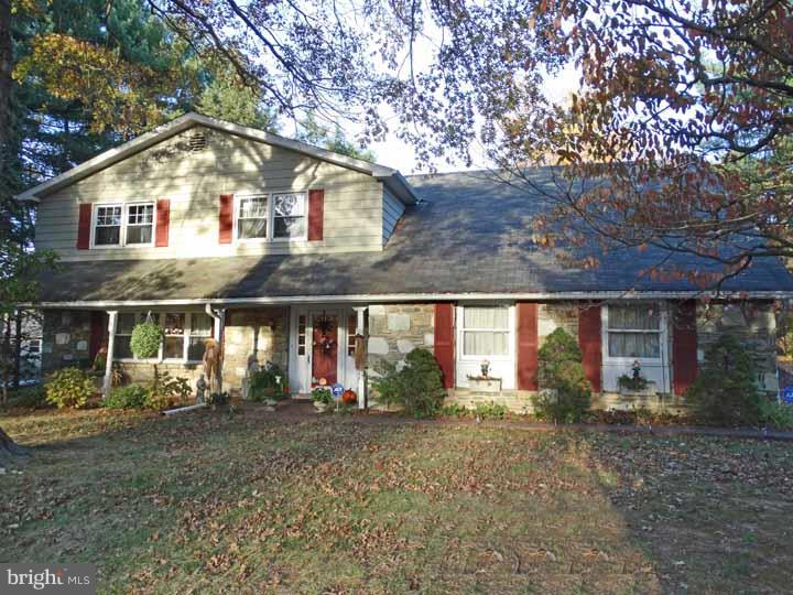 You won't be disappointed with this absolutely charming, beautiful and ready to move into 4 bedroom, 2 1/2 baths Colonial in the very desirable Justa Farms located in the very prestigious Lower Moreland school district. Enjoy sitting and relaxing on the covered front porch.  Enter through a foyer that boasts a curved staircase and coat closet. You'll love the living room and dining room with hardwood floors and the eat in kitchen with desk, lighted ceiling fan, gas cooking and chair molding, Family room with brick gas fireplace, berber carpet, sliding glass doors to your 3 season room and door to your deck with a walkway to your wishing well. There is a beautifully landscaped back yard and a shed for extra storage. Laundry room w/utility sink, closet, cabinets and shelves for all your cleaning supplies. Remodeled powder room, bonus room/office that could be used as a 5th bedroom. A 2 car garage with electric opener completes this first floor. Second floor with Main bedroom w/berber carpet, dressing area and his and hers closets.  Main bath w/stall shower, sink and vanity and ceramic tile. Large 2nd,3rd and 4th bedrooms w/hardwood floors.  Hall bath w/tub, shower, double sinks, vanity, ceramic tile and so much more!!!  Make your appointment today!!!