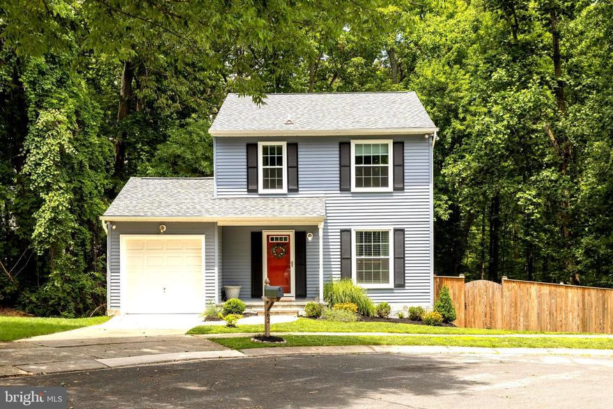 Welcome Home to the sought after community Hunters Pointe.    This beautiful home was fully renovated less than 3 years ago!  New Roof-New appliances-New floors- transferrable warranties include a warranty on the foundation! The new fireplace in the living room is the perfect touch to this meticulously maintained home.  Kitchen boasts soft close white cabinets, large farmhouse sink and beautiful countertops and separate dining area with sliding glass doors to the spacious deck perfectly situated for privacy. There is so much additional living space with the fully finished lower level for approx 2000 sq feet of living space.  The downstairs family room has sliding glass doors that lead right out to the paver patio and fully fenced yard.  Bedrooms are spacious -and an added plus-the primary suite has a bathtub -not just a standup shower :)  Garage, driveway , and street parking all available.
Hunters Pointe is a prime location with convenient access to College Parkway and Route 2- just minutes away from Annapolis and the Naval Academy and a short commute to Baltimore.   Located on a quiet cul-de-sac backing to the trees you get the great combination of privacy and convenience!
*OFFERS DUE 7/10/23 5PM*