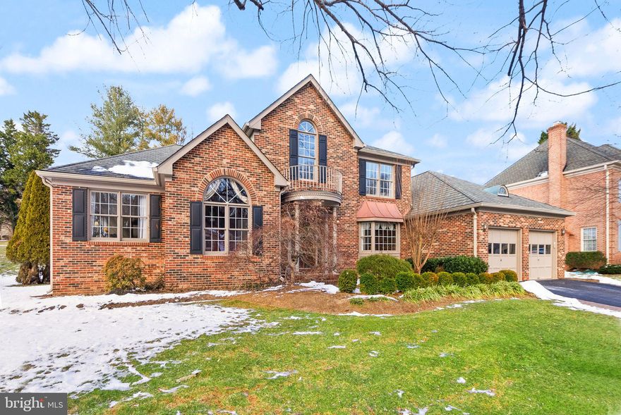 GORGEOUS HOME WITH MAIN LEVEL OWNER'S SUITE! Welcome to this luxurious and classic home, perfectly situated on a prime 1/2-acre lot in Vienna, just four miles from Tysons Corner! Nestled in a beautiful, prestigious neighborhood known for its spacious lots and exclusive feel, this home boasts a wealth of thoughtful features and a warm, inviting atmosphere, including neutral paint, hardwood floors, and crown molding and trim. As you approach the home, the three-sided brick front and Hardiplank siding exude classic elegance, complemented by a covered portico and mature landscaping. Greet friends and family in the stunning two-story foyer with hardwood floors. The main level is both gracious and convenient, featuring a formal living room with a wood-burning fireplace and a private office with tall ceilings. The formal dining room, with its bay window, is perfect for hosting family gatherings. The inviting family room, also with a wood-burning fireplace, is adjacent to the newly remodeled kitchen! The kitchen was redesigned in 2022 with handsome two-tone cabinetry, a Wolf six-burner gas cooktop with a stylish hood, double ovens, a built-in pantry, and a large island with quartz countertops. Natural light pours into the breakfast room through the charming bay window, which offers lovely views of the backyard. The main level also offers an elegant owner’s suite with vaulted ceilings, two closets, and a large, spa-like bath, ready for your modern updates. **  The upper level features a landing with hardwood floors and three generous bedrooms and two full baths. The princess suite offers a private bath, while bedrooms two and three share a secondary bath with double vanities. The lower level features a large recreation room and full bath with new carpet and paint, offering plenty of possibilities for entertainment or relaxation. There is also ample space for storage and an office to complete the lower level. The expansive flagstone patio, complete with a built-in bench and grill with a power burner, invites outdoor relaxation and entertaining. This lovely home offers a wonderful backyard setting and comes with a front-load two-car garage. Enjoy the comfort and serenity of this beautiful community, with all the luxuries one could desire in a stunning home. Great location, close to the charming Vienna commercial district, as well as parks, shopping, dining, Tysons Corner, Reston, Meadowlark Botanical Garden, Wolf Trap, Great Falls National Park, Lake Fairfax, and Roer's Zoofari. Easy access to the Silver Line Metro, Rt. 7, Dulles Toll Rd, and Georgetown Pike!