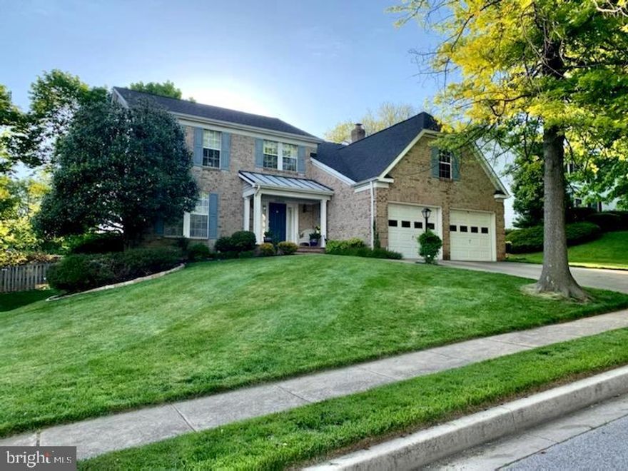 Welcome to Owings Meadows in Owings Mills.  This secluded subdivision has 125 single-family homes, with only one way in and out - via Hewitt Farms Rd.,  a tree-lined,  5th-of-a -mile  roadway.  As a result, this community is like a huge cul-de-sac, but with six internal streets.
 
One of the homes in this quiet neighborhood is 10832 Meadowlea Road, a 3,266-square-foot Colonial with 4 bedrooms and 3 full bathrooms, 1 powder room, a 2-car garage and a basement with a spacious finished section and a huge storage area.

After going through this house's covered front porch and main door, one is welcomed by a two-story foyer.  The easy flow from the foyer to the living room, to the dining room, to the spacious kitchen, to the charming breakfast area and to the family room has to be seen to be appreciated.

The interior gets plenty of light through the huge windows in the living room and above the foyer.  More light pours in through the bay windows in the dining room and family room.  And not to be outdone, the sliding glass door of the breakfast area and the twin windows over the kitchen sink contribute to a bright and airy atmosphere.

Among the noteworthy features of the main level are hardwood floors, a double wall-oven in the kitchen, a wood-burning fireplace in the family room, several convenient closets and a laundry chute from the upper-level master bathroom to the first-floor laundry room.

The new sliding glass door of the breakfast area has built-in blinds and leads into an enormous deck in the back of the house.  The backyard is bordered by trees that offer both a serene view and some privacy.

The upper-level hallway provides a bird's eye view of the foyer and leads to four bedrooms, including a spacious master suite, complete with a convenient walk-in closet and a large bathroom.

The large walk-out basement has a new French door that leads to a concrete patio and a sizable backyard.  The 21x22-foot garage has ample space not only for two vehicles but also for various kinds of tools and gardening equipment.

Last but not least, the entire house is sheltered from the elements by a new architectural-shingled roof, installed in 2020.  Convenience - Costco, Lowe's and Giant are about 3 miles away, while Wegmans and the Foundry Row shopping center are even closer,  just 2.5 miles away!