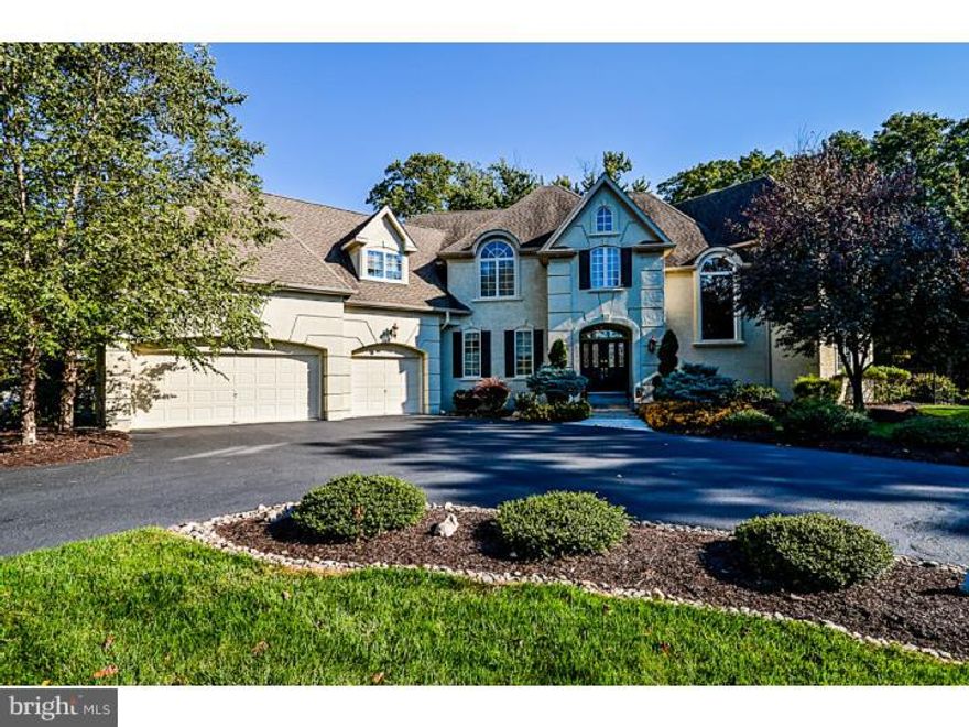 Welcome to this breathtaking, exquisite and completely custom estate in the picturesque community of Greystone.  Proudly built by  "The Gigliotti Group". This home offers 4 bedrooms, 4 1/2 baths, 3 car heated garage, and a "Home Lift" 3 story Elevator.  Enter into the new double door entrance to the two story foyer with gleaming hardwood, wainscoting and beautiful mill work.  The chef's dream kitchen offers 42" maple-wood cabinets with under the cabinet lighting, high end appliances, Sub-Zero built-in refrigerator, wine fridge, new Asco dishwasher, Jenn-Air trash compactor, double Dacor convention wall ovens and Dacor electric cook-top. Also, granite counters, island workspace and walk-in pantry.  Come and relax on the flagstone patio with fenced-in private yard, sprinkler system mature trees and professional landscape on 1 acre lot. Adjacent the kitchen is the 2 story family room with gas fire place, marble hearth, hardwood floors and a wall of windows with beautiful wood plantation shutters.  Luxurious living room with neutral wall to wall carpet and dining room with wainscoting, hardwood and bay window.  The 2nd story offers 2 master bedroom suites with sitting area and master bath with his and her vanity, stall shower and soaking tub.  Two additional bedrooms with 2 full baths.  The finished walk-out basement offers 10' ceilings, an office, work-out room, full bath, plenty of room for entertaining (plumbed for wet bar) and storage.