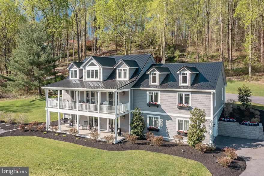 Welcome Home, To This One-of-a-kind, Lake View Home.  This custom beauty features 4 Large Bedrooms and 3 Full Baths on 1.39 acre. This is one floor living for those that are looking for a Rancher when you enter from the back. The home would also be great for large families or In- laws with their own wing on the Main Level.  Custom designed so that every major room including the basement has stunning lake & mountain views. The main level features an open floor plan with 9 Ft ceilings, crown molding, French doors, 8 Ft sliders & vinyl plank flooring. The kitchen boasts 42 in cabinets, stunning quartz counter tops, a large island and SS appliances. Also, on the Main level are 2 of the Bedrooms, 3 Walk in closets and 2 full baths.  The upper level was just completed in 2022 and features 2 large bedrooms, multi-purpose room, & full bath. The large unfinished basement has endless possibilities- rough in for full bath & ample space for multiple rooms/in law suite/etc. This home's foundation was constructed with Superior Walls and is very energy efficient with low utility bills.  There is a 2 Car oversized garage with attic storage on main level, plus a one car garage on lowest level.  French doors open to a 10 ft wide covered porch with Trex decking, ceiling fans and vinyl railings.  Enjoy the outside space all year around while taking in the views and canoes on the lake. Dual heating and AC zones. Generac Generator. Beautifully landscaped gardens with lighting.   Packed with extras & unique touches throughout.  Located minutes from the MD Line & Liberty Mountain Resort. Only 30 Minutes from Frederick Md!  Pa is a tax savings state for the retired at this time. Seller is a Md -Pa Real Estate Broker.