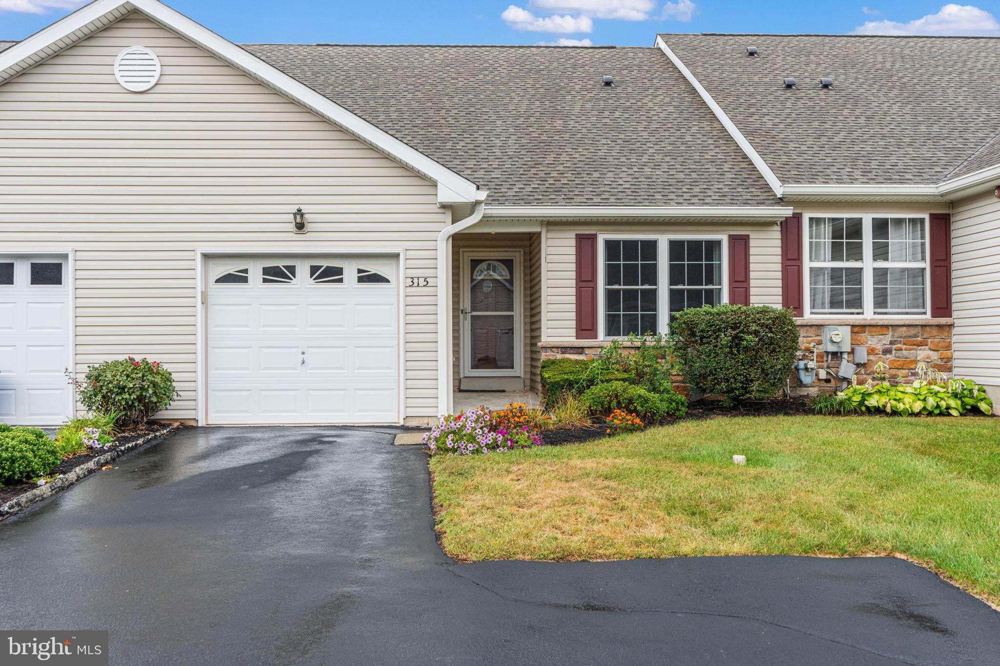 Welcome to 315 Jefferson Court, a rare opportunity to own a beautifully maintained townhome in the desirable William Penn Villas—an active adult 55+ community located in the heart of Limerick Township. This spacious 2-bedroom, 2-bathroom home offers true one-floor living with an open and inviting layout that’s perfect for both everyday comfort and entertaining. Step into the bright eat-in kitchen featuring ample counter space and cabinetry, which seamlessly flows into the living area and rear sunroom—an ideal spot to enjoy your morning coffee or take in serene views of the community’s green spaces.
The primary suite offers a peaceful retreat with a large walk-in closet and a private en-suite bathroom. A second bedroom, currently used as an office, and a full hall bath provide flexible living options. Additional features include hardwood flooring throughout, a conveniently located laundry room, and an attached front-entry garage for easy access. The full, unfinished basement offers plenty of potential for additional living space or abundant storage.
William Penn Villas is known for its vibrant community atmosphere, complete with a clubhouse, walking trails, bocce ball court, and a charming gazebo. The HOA takes care of exterior maintenance, lawn care, snow removal up to the front door, trash pickup, and upkeep of common areas—offering a truly low-maintenance lifestyle. Recent community upgrades include new roofs and gutters throughout, ensuring long-term peace of mind. If you’re seeking comfort, convenience, and a welcoming community, 315 Jefferson Court is the perfect place to call home.