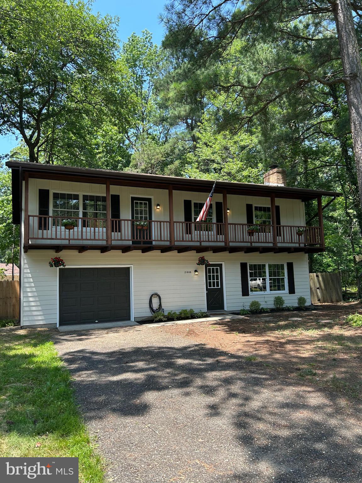 Recently updated and move inbox ready home. This home is tucked away in a peaceful setting on a private street. It offers 4 bedrooms, 2-1/2 baths, 2 living areas, balcony, fireplace, over size garage, new laundry room and fenced back yard and redwood siding. New updates include kitchen cabinets, tops and appliances, bathrooms and new HVAC system. The water utilities are provided by METCOM. Beautiful back deck to enjoy coffee or just relax. Additional features include beach access, community amenities and convenient proximity to Pax River NAS. This home is the perfect blend of modern living and convenience, don't miss the chance to make it yours.
