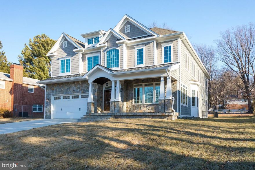 PRICE DROP !!! BIGGEST LOT IN THE NEIGHBORHOOD !Front with stone/hardi-plank; 10 feet ceilings; crown molding; chair rail molding ; coffered ceiling; oak HW floors on 2 levels; large gourmet kitchen w/ THERMADORE appliances; Enormous master-suite w/ sitting area, large bath w/ marble floor, separate rain shower. Fully finished walk-out basement w/ wet bar and exercise room .Motivated seller .