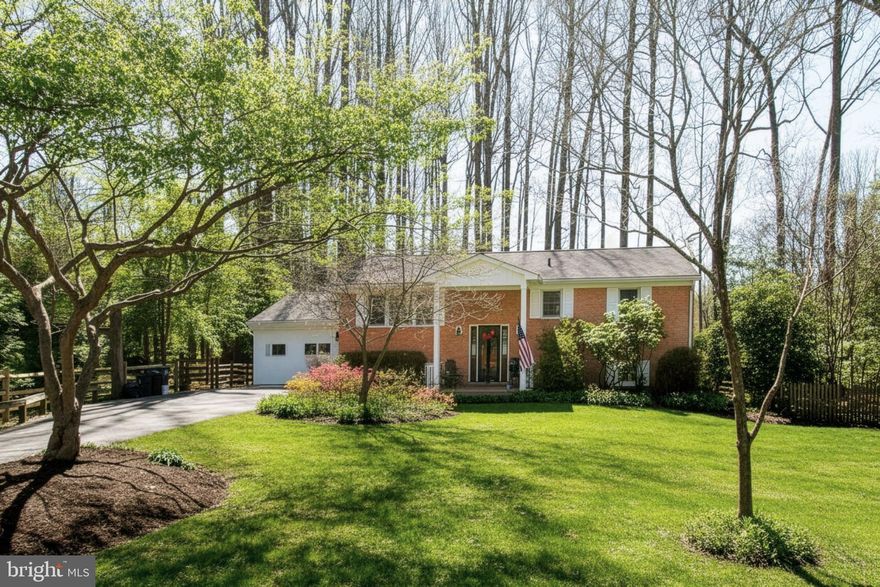 Discover the perfect blend of convenience and tranquility in this stunning all-brick home, ideally located just minutes from I-66 and Fairfax County Parkway. Nestled on nearly an acre in a quiet cul-de-sac, this beautifully wooded property offers exceptional privacy in a rare no-HOA community. This is an absolute haven for bird and wildlife enthusiasts.

The charming front porch sets the tone for peaceful mornings with coffee, while the back porch is perfectly designed for relaxing evenings under the stars. Inside, the upper level showcases gleaming hardwood floors throughout. The elegant living room is filled with natural light from a large picture window and features a cozy wood-burning fireplace with a classic mantle.
 

The spacious kitchen is both functional and inviting, featuring rich maple cabinetry, Corian countertops, and a stunning 48" Andersen casement window overlooking the serene backyard. Additionally, the French wood sliding door leads to an expansive rear deck spanning the length of the home. This layout is perfect for entertaining or enjoying quiet outdoor moments with family and friends.

Step outside to the private backyard retreat, where mature trees create a peaceful, park-like setting. A charming swing set offers the ideal space for children to play and explore, adding to the home’s warm, family-friendly appeal.

This upper level of the home also includes three generously sized bedrooms, and two updated bathrooms.

The lower level offers a warm and versatile living space with a large family room, complete with a second wood-burning fireplace, custom built-ins, and a dedicated desk area ideal for work, study, or creative projects. A third full bathroom adds convenience, along with an additional room that can serve as a fourth bedroom or private office.

Completing the home is an expansive workshop and storage area with direct walk-out access to a charming stone side patio. This is ideal for hobbies, projects, or additional outdoor enjoyment.

With room for everyone and surrounded by nature, this welcoming property is truly a private retreat you must experience in person!