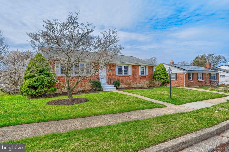 Rare Opportunity!  A rare chance to own a brick rancher in the desirable DVIA community at this price. This well-maintained 3-bedroom, 2-bath home offers hardwood floors, a separate dining room, and a spacious kitchen with cabinets that are in great shape. The kitchen level also includes a side door for easy outdoor access.   The basement is larger than most in the neighborhood and offers excellent space for entertaining, complete with a bar, ornamental gas fireplace, and walk-out access.  There is a full bath in the basement.  Tons of storage.  Step outside to a covered patio, rear yard, and an additional sitting porch off the back, all surrounded by mature landscaping.  Two car driveway parking.  Improvements include:  New air conditioning (2023), furnace (2011), roof (2015), electric panel upgrade to code (2007), and washer & dryer (2015).  Close to schools, shopping, restaurants and 695.  Total square footage approx 2726. CHECK OUT THE VIDEO TOUR!  *** Open house -Sunday  4/12/26 12:00-2:00***