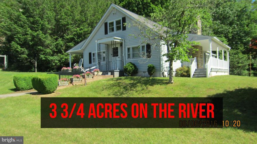 Just sit on front porch or sun room and enjoy the view of WV cleanest river. Only 23 miles from Winchester.  Property line runs through the center of the Capon River - there's a place to walk down to river and a place where an entrance on to the river could be created for canoes etc.  Artisan well, woodstove in basement, fire place, all good asphalts roads. *** NO HOA***