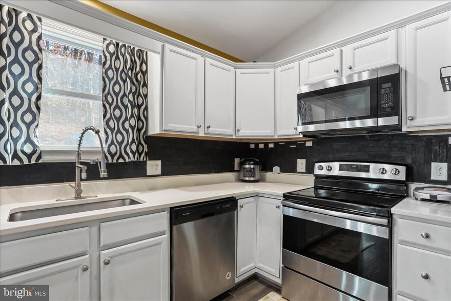 Escape to this beautiful property! Welcome home to this charming 3 bedroom, 2 bath retreat,  nestled on 0.57 acres of peaceful countryside.  Enjoy the freedom of no HOA and plenty of space to relax, garden, or simply take in the quiet surroundings.  Inside, you'll find a bright and inviting open concept layout with comfortable living areas perfect for family gatherings or cozy nights in.   Has Germicidal Disinfection Water treatment System.  Partially finished basement, with rough in for bathroom and 2 framed up rooms.